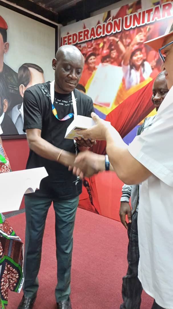 Maitre Nkela Nseniba Kevin go,SGA -Pcco à Caracas au congrès antifasciste